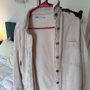 Beige Zara ripped denim jacket